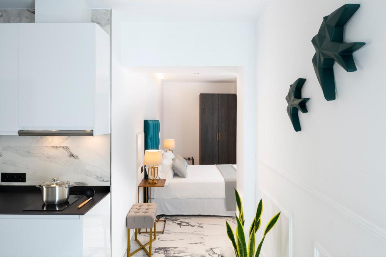 Quivir Apartamentos Deluxe Casa Del Arco Andújar Exteriör bild