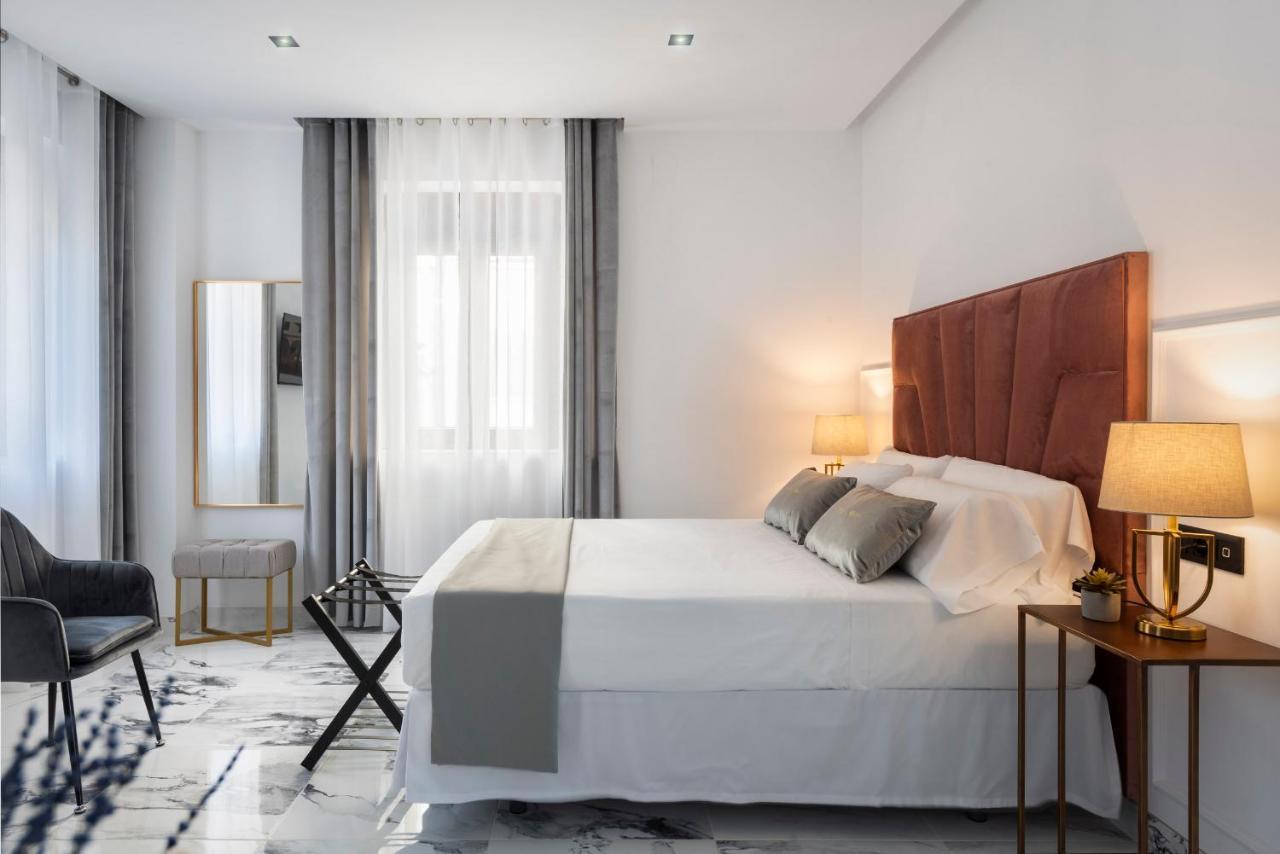 Quivir Apartamentos Deluxe Casa Del Arco Andújar Exteriör bild