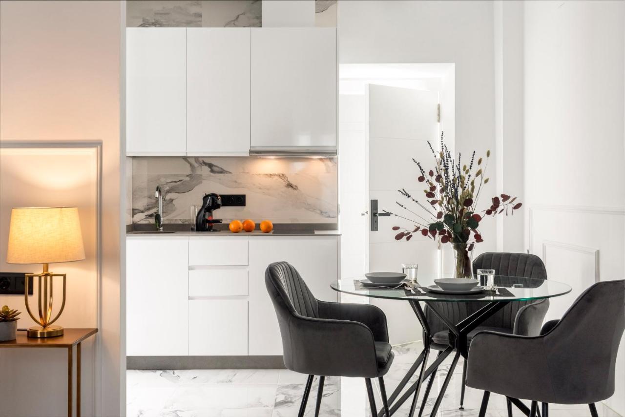 Quivir Apartamentos Deluxe Casa Del Arco Andújar Exteriör bild
